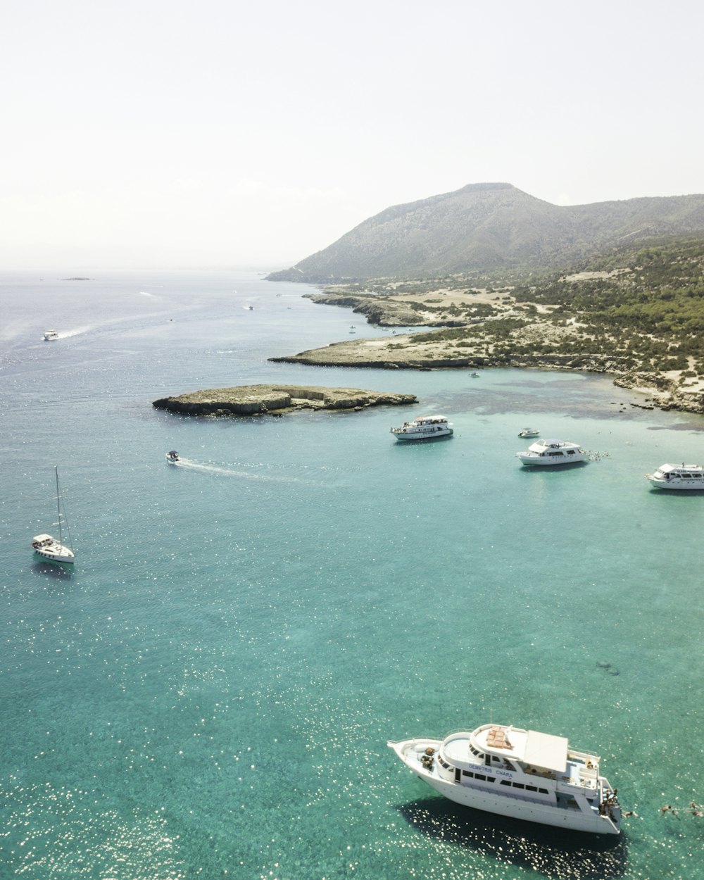 Boats on calm blue water off the Cyprus coast